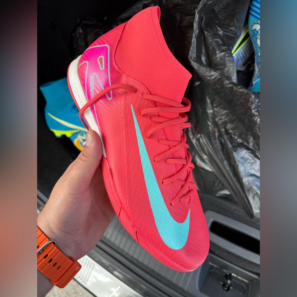 Nike Bright Pink Cleats with Blue Swoosh